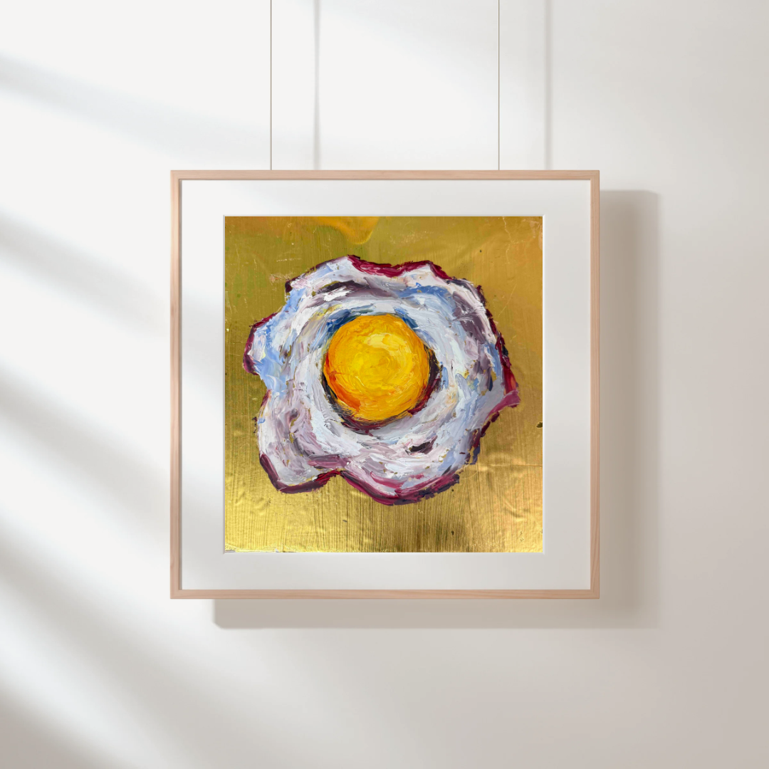 Gold Series - Fried Egg 02 original oil painting by Kritteka, framed on a white wall